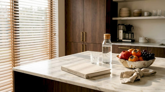Woman reading supplement label in kitchen